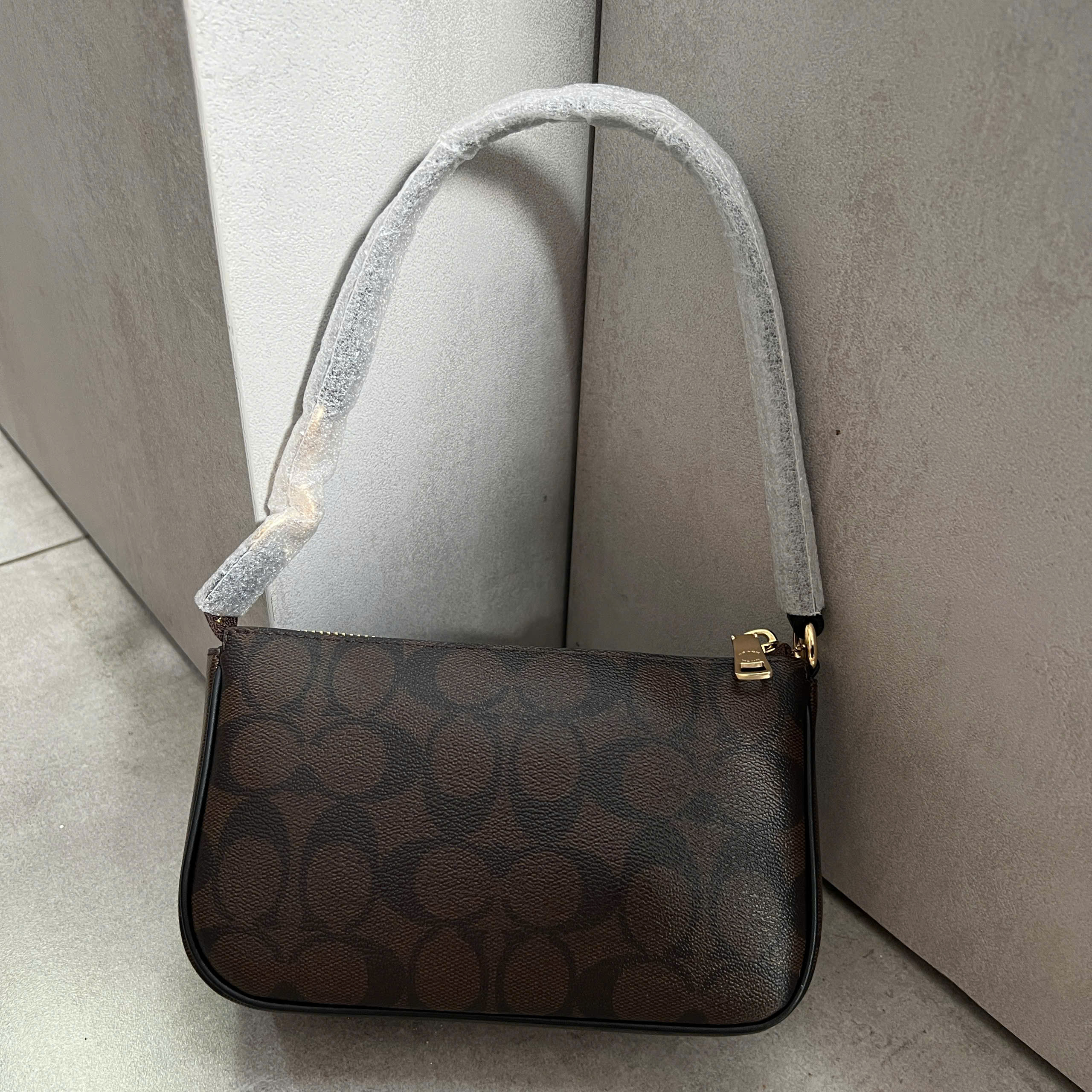 COACH SIGNATURE NOLITA BAG - DARK BROWN