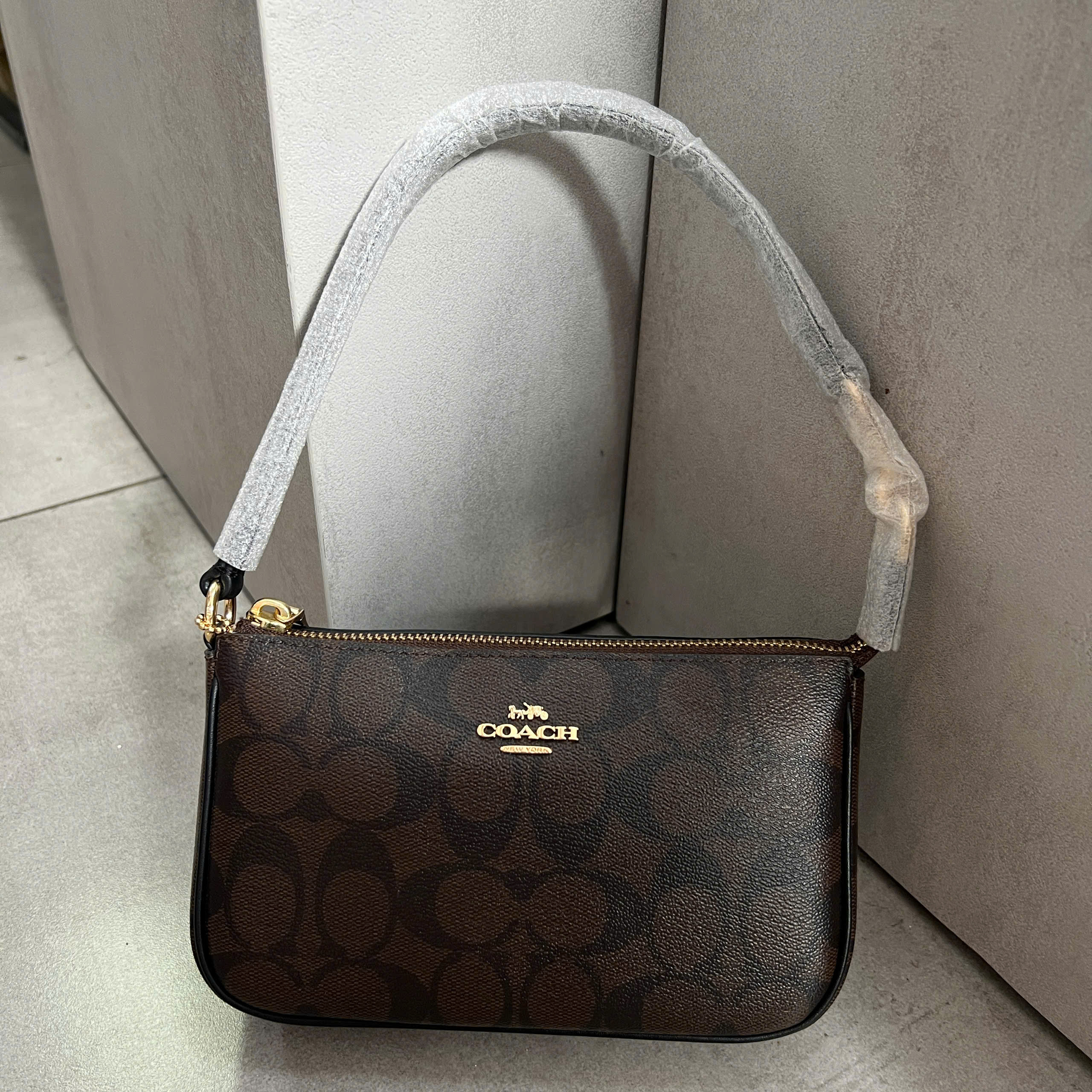 COACH SIGNATURE NOLITA BAG - DARK BROWN